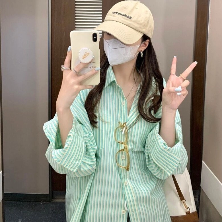 4 chiếc áo sơ mi mà tôi đang phát cuồng chị em nên sở hữu một chiếc để trông thon gọn hơn và che đi mỡ thừa