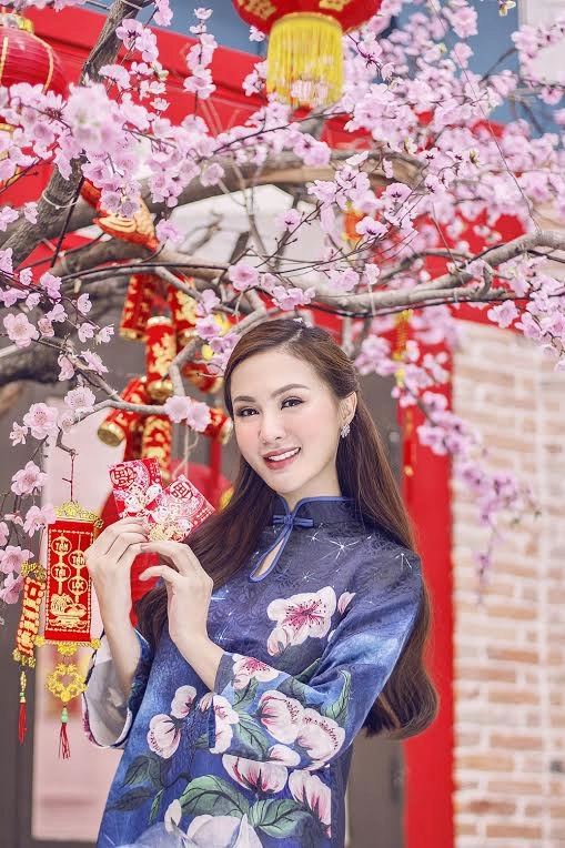 Kelly nguyễn ngọt như kẹo với áo dài pastel chuẩn bị đón năm mới