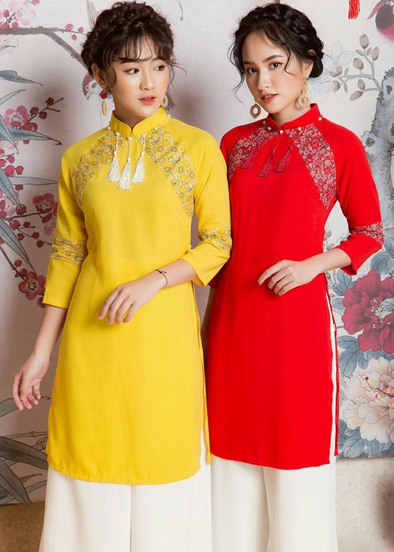 Tết năm ngoái áo dài cách tân bị chê mắm tôm trộn socola nhưng năm nay vẫn cực hot